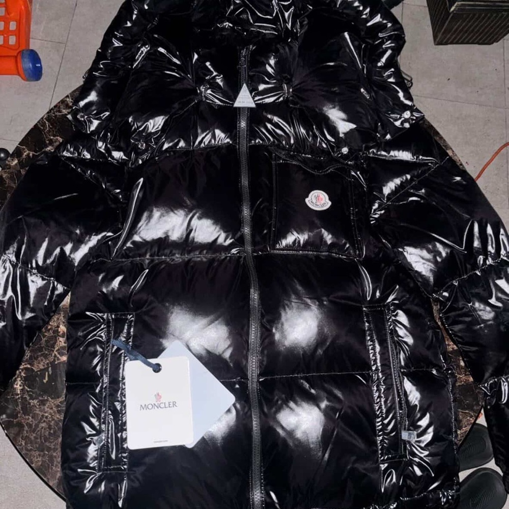 Moncler Black Shiny Quilted Jacket with Comic Care Patch